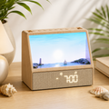Sunrise alarm clock with Bluetooth speaker and white noise machine glowing warm light on bedside table bedroom sleep aid gift